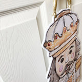 White Gold Nutcracker Door Hanger