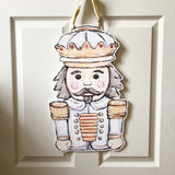 White Gold Nutcracker Door Hanger